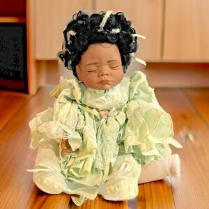 Doll African American weighted baby  made from  soft rubber  and  cloth body 19"